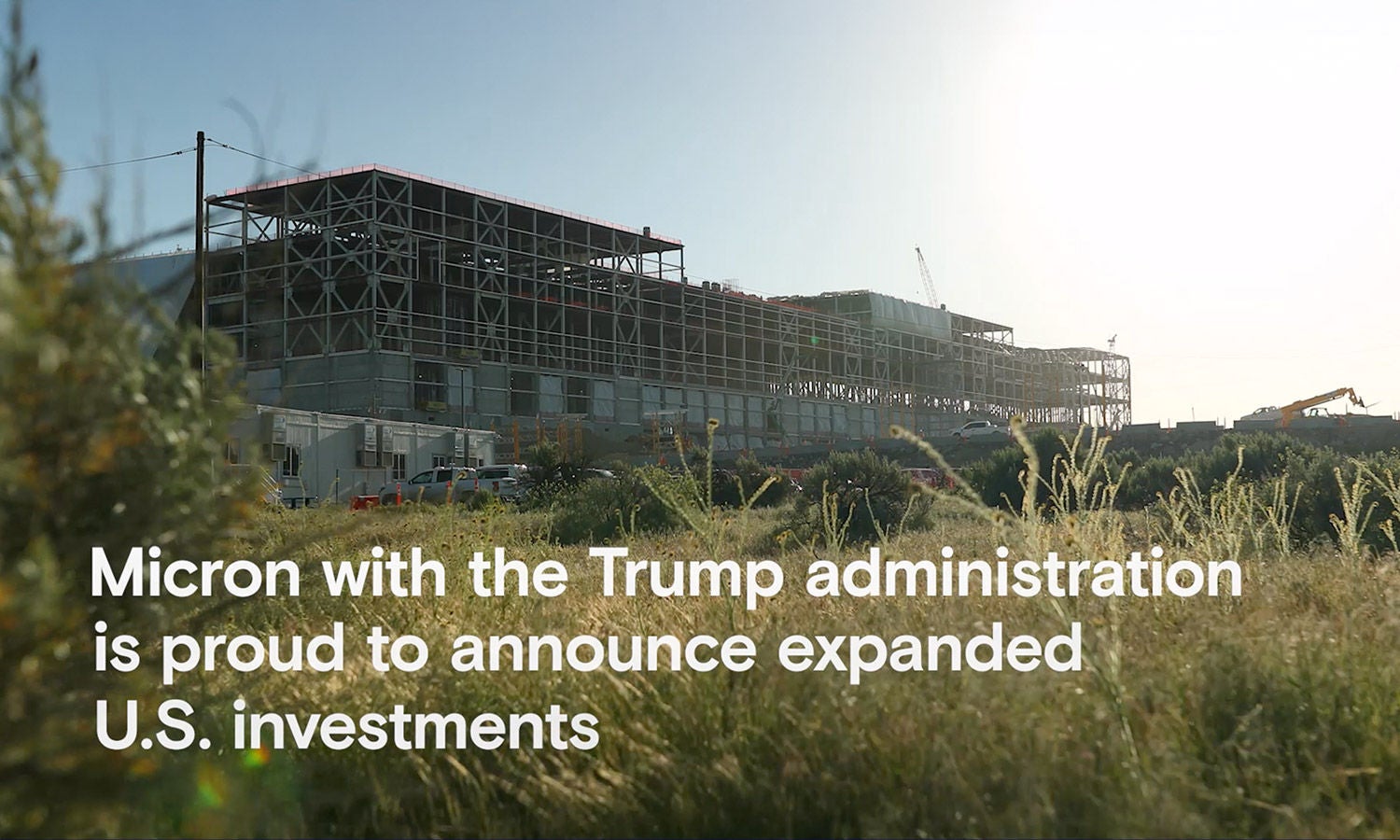 Construction site with white text reading "Micron with the Trump administration is pround to announce expanded U.S. investments"